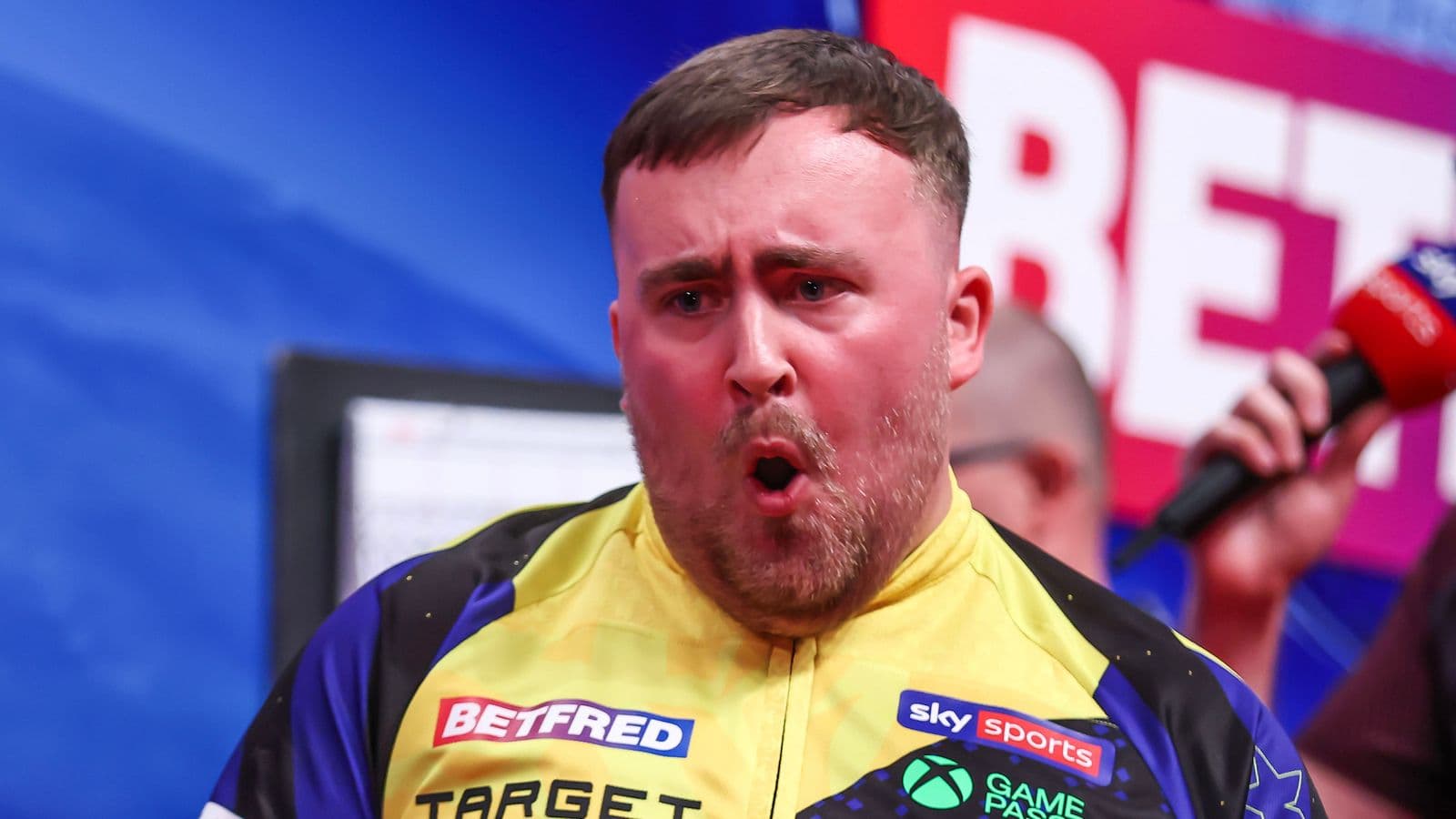World Matchplay Darts: Luke Littler hits-nine darter in epic 11-8 win over Nathan Aspinall as Michael van Gerwen beaten