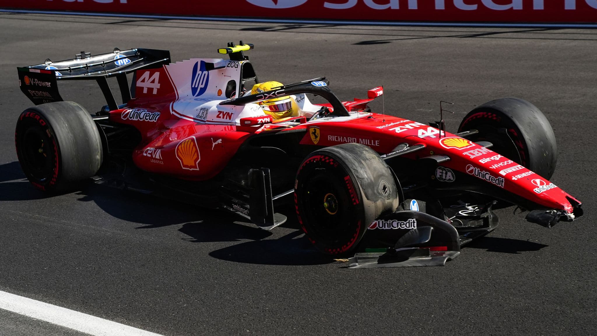 Lewis Hamilton tried to limp around with a damaged car until he eventually stopped in the middle sector (PA)