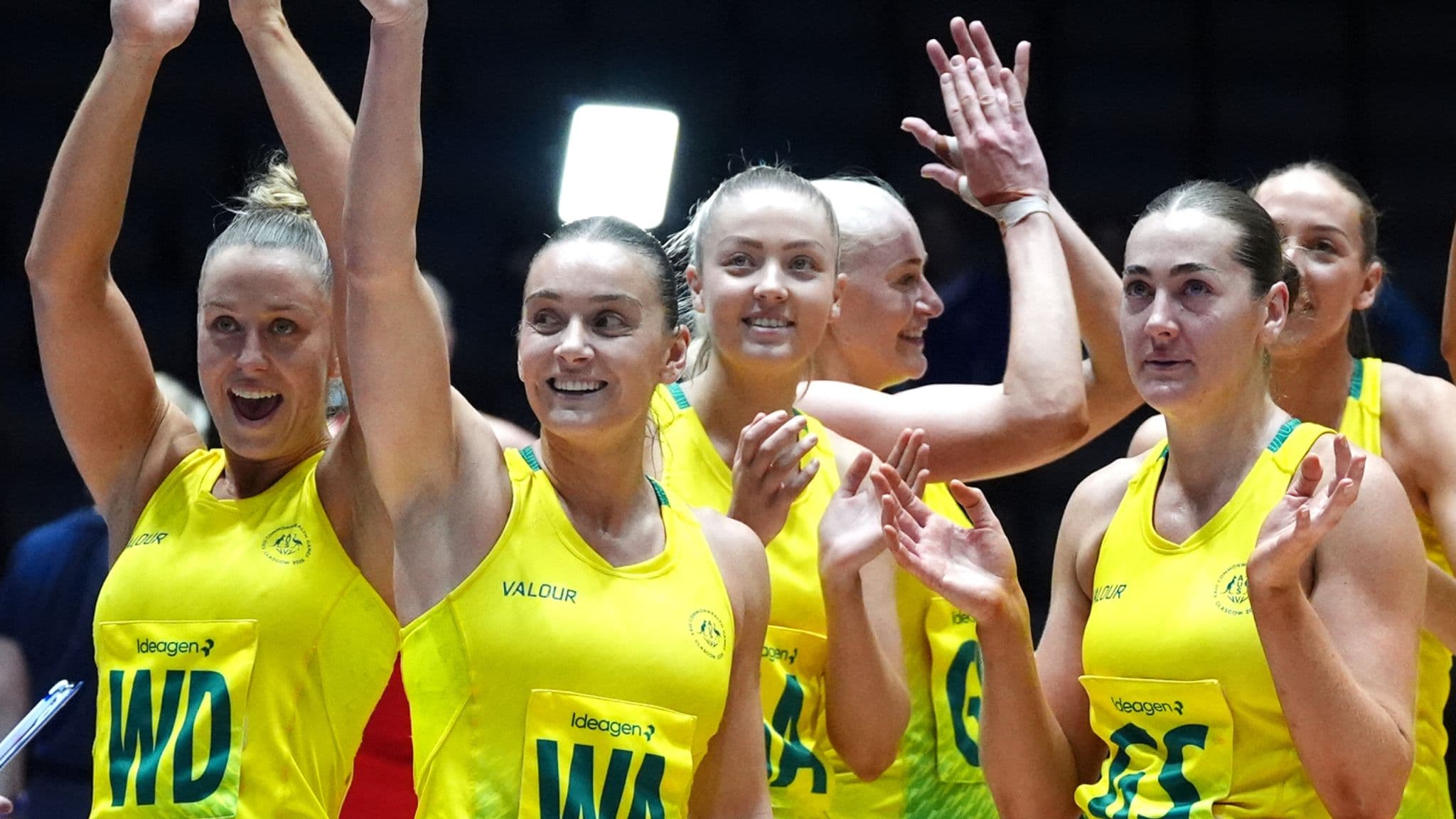 Australia players celebrate winning bronze at the Commonwealth Games
